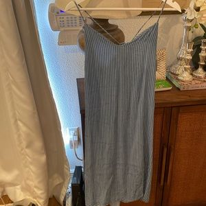 stripped midi-dress w/ tie in the back to adjust your straps. Size S